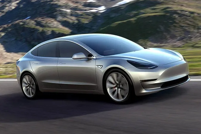 Tesla Model 3 Arrives With a Surprise 310-Mile Range